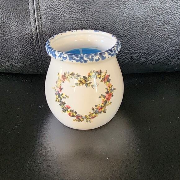 Stoneware Candle Other - Stoneware Candle Holder with Blue Candle The multicolor flower design adds a pop
